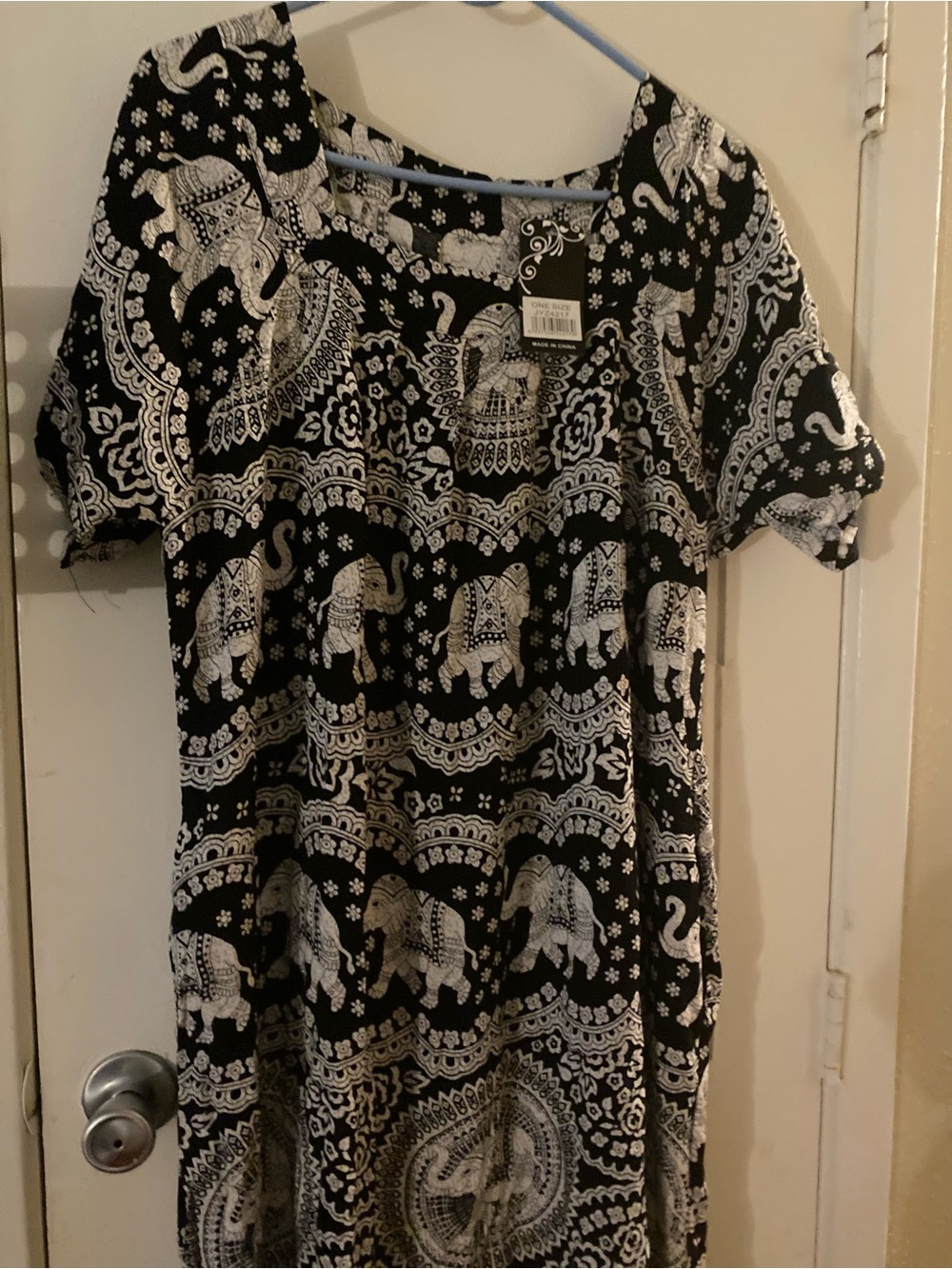 Source Unknown Black Tunic Top with White Elephant Print